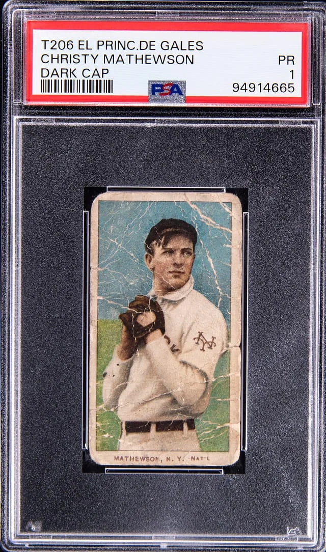1909-11 T206 Christy Mathewson, Dark Cap - El Principe De Gales Back White Border #no-number card image