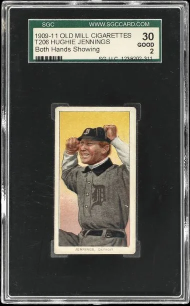 1909-11 T206 Hughie Jennings, Both Hands Showing - Old Mill Back - Hall of Famer White Border #no-number card image