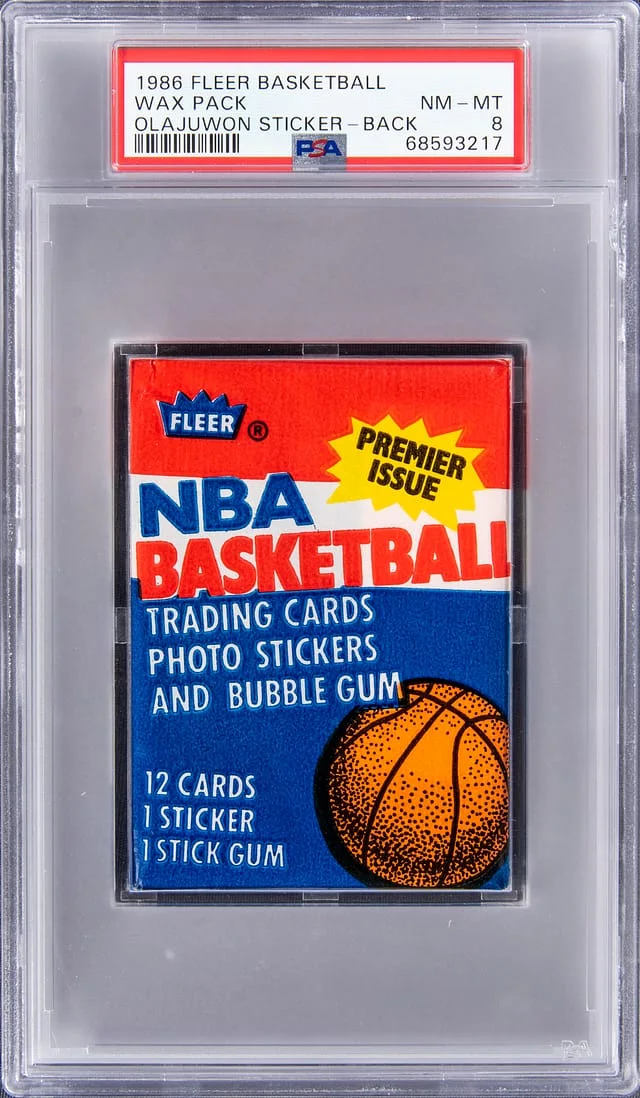 1986-87 Fleer Basketball Unopened Wax Pack (12 Cards) – Hakeem Olajuwon Sticker on Back – Possible Michael Jordan Cards #no-number card image