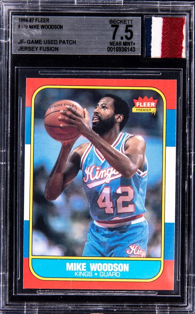 1986-87 Fleer Mike Woodson Game-Used Jersey Fusion #129 card image