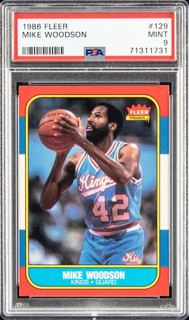 1986 Fleer Mike Woodson #129 card image