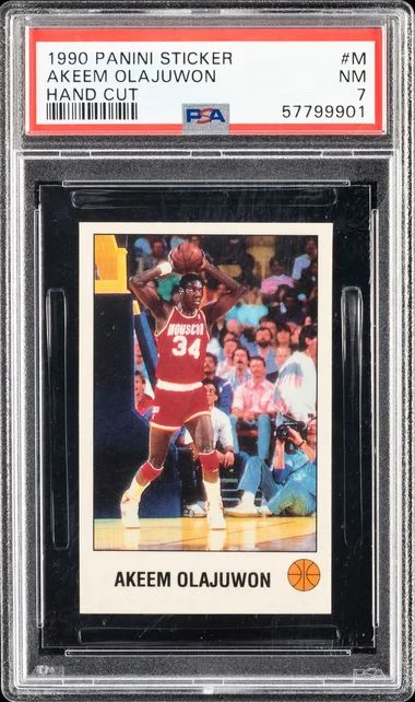 1990-91 Panini Akeem Olajuwon Sticker Hand Cut #M card image