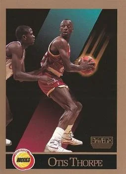1990-91 SkyBox Otis Thorpe ERRERR: Mitchell Wiggins pictured on front (holding ball vs defender) #112a card image