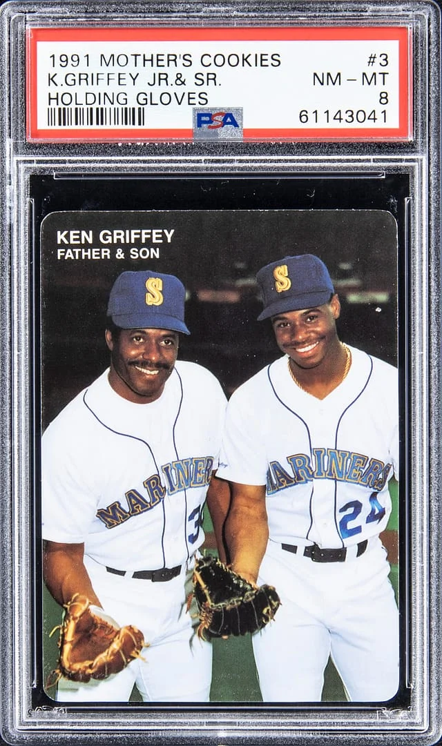 1991 Mother's Cookies Ken Griffey Jr. & Sr., Holding Gloves #3 card image