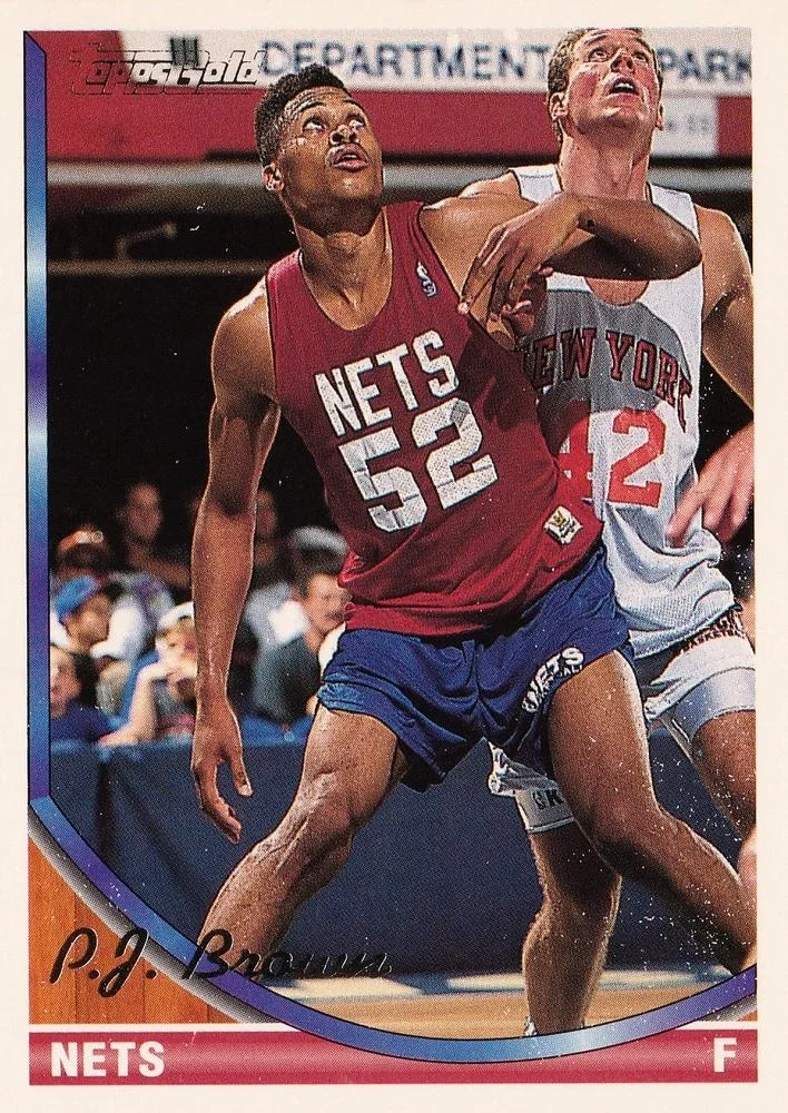 1993-94 Topps P.J. Brown Gold #94 card image