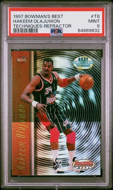1997 Bowman's Best Hakeem Olajuwon Techniques Atomic Refractor #T8 card image
