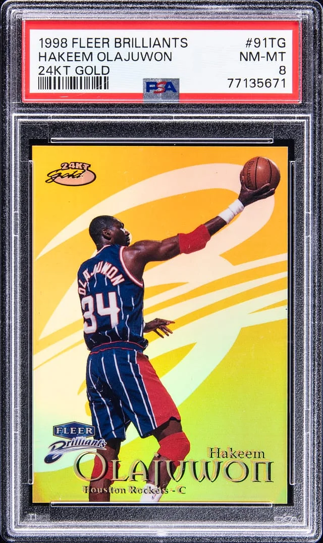 1998-99 Fleer Brilliants Hakeem Olajuwon 24KT Gold #91TG card image