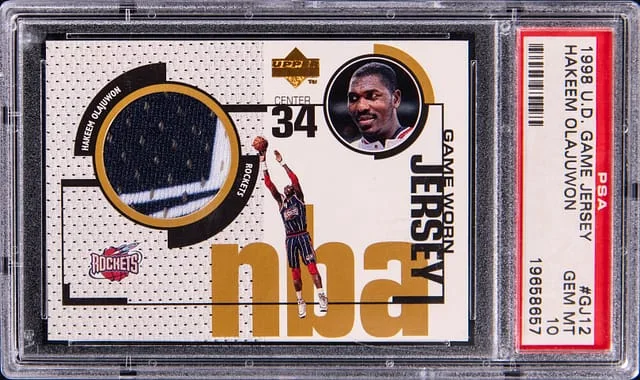 1998-99 Upper Deck Game Jersey Hakeem Olajuwon Game-Used #GJ12 card image