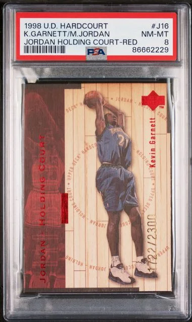 1998-99 Upper Deck Hardcourt Kevin Garnett/Michael Jordan Jordan Holding Court Red #J16 card image