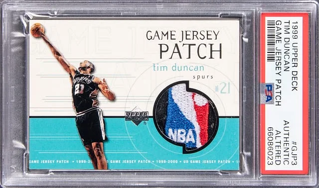 1999-00 Upper Deck Game Jersey Tim Duncan Game-Used Logoman Patch #GJP3 card image