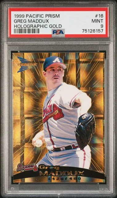 1999 Pacific Prism Holographic Gold Greg Maddux #16 card image