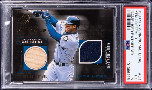 1999 Upper Deck SPx Ken Griffey Jr. Winning Material Game Used Bat/Jersey #JR card image