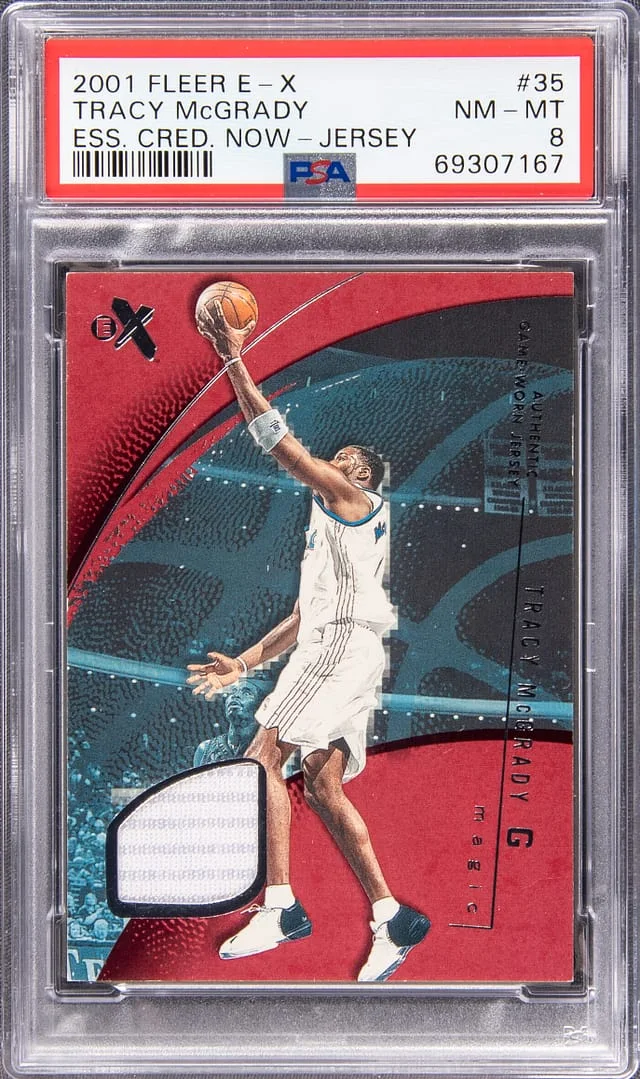 2001-02 Fleer E-X Tracy McGrady Essential Credentials Now Jersey #35 card image