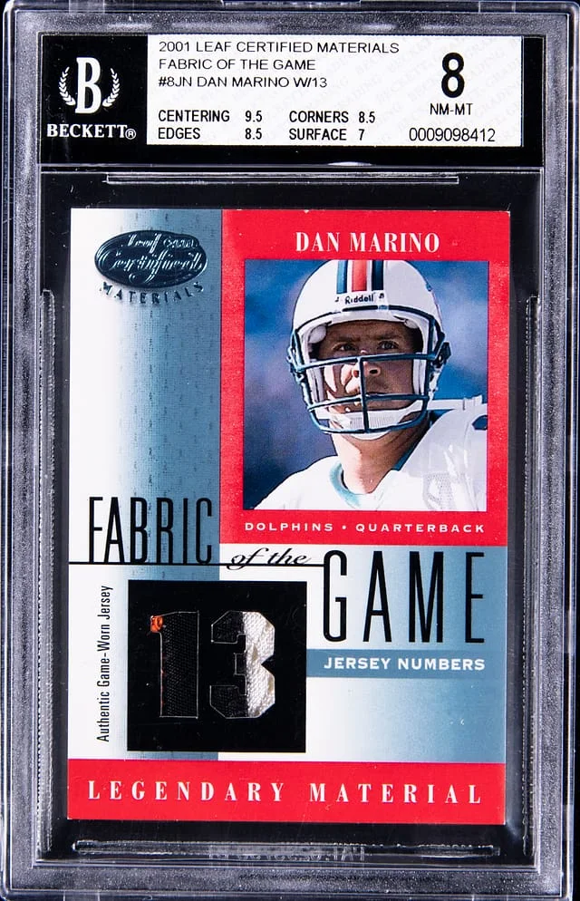 2001 Leaf Certified Materials Dan Marino Fabric of the Game #FG-8 card image