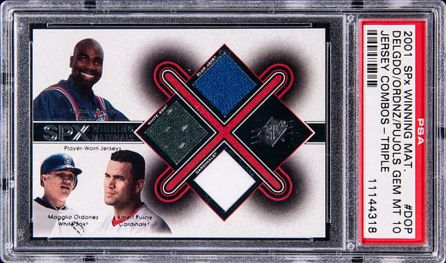 2001 Upper Deck SPx Albert Pujols/Magglio Ordonez/Carlos Delgado Winning Materials Jersey Combos Triple #DOP card image