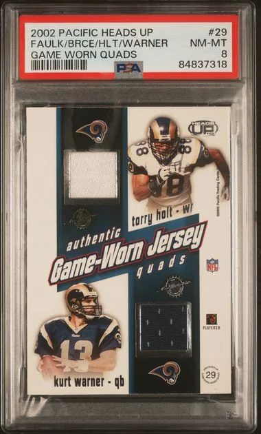 2002 Pacific Heads Up - Game Worn Quads Isaac Bruce/Kurt Warner/Marshall Faulk/Torry Holt #29 card image