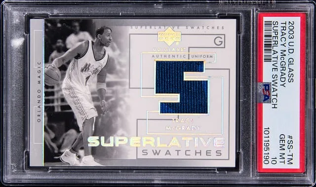 2003-04 Upper Deck Tracy McGrady Glass Superlative Swatch #SS-TM card image