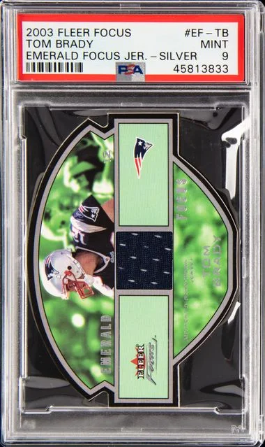 2003 Fleer Focus Tom Brady Emerald Focus Jersey Silver #EF-TB card image