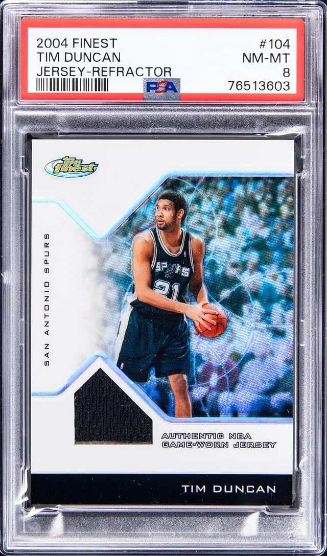 2004-05 Topps Finest Tim Duncan Jersey Refractor #104 card image