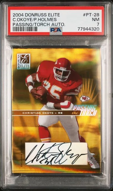 2004 Donruss Elite Christian Okoye/Priest Holmes Passing The Torch Autographs #PT-28 card image