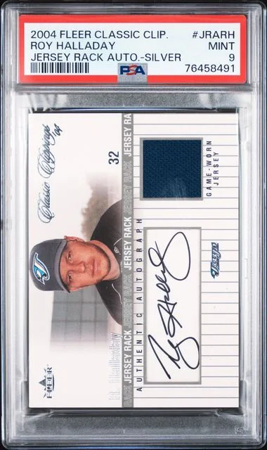 2004 Fleer Classic Roy Halladay Clippings Jersey Rack Autograph Silver #JRARH card image