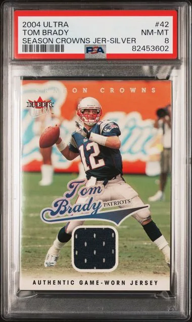 2004 Ultra Tom Brady Season Crowns Game Used Season Crowns Jersey-Silver #42 card image