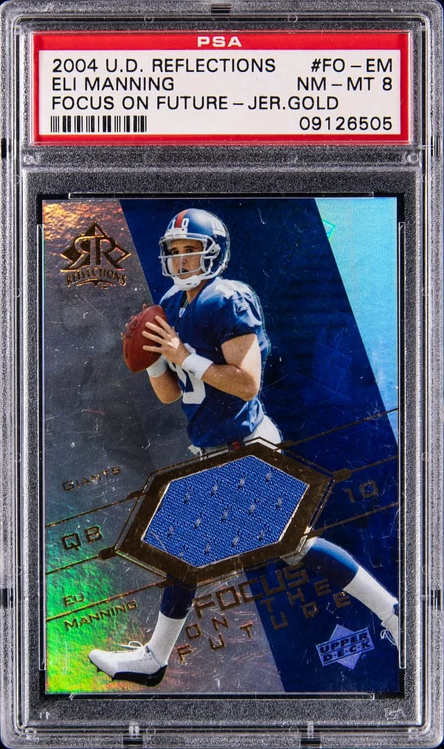 2004 Upper Deck Eli Manning Reflections Focus on Future Jersey Gold #FO-EM card image