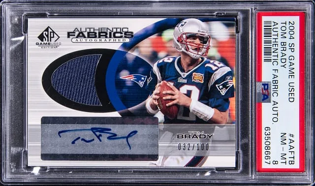 2004 Upper Deck SP Game Used Tom Brady Authentic Fabric Autograph #AAFTB card image