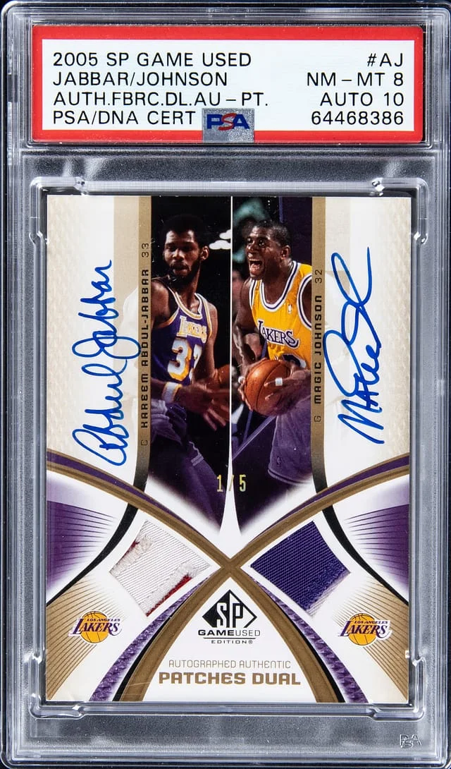 2005-06 Upper Deck SP Game Used Kareem Abdul-Jabbar/Magic Johnson Authentic Fabric Dual Autograph Patch #AAP2-AJ card image