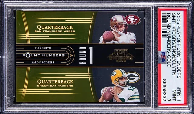 2005 Donruss Aaron Rodgers/Alex Smith/Cedric Benson/Mark Clayton - Rodgers' Jersey Number Playoff Contenders Round Numbers Gold #RN-11 card image