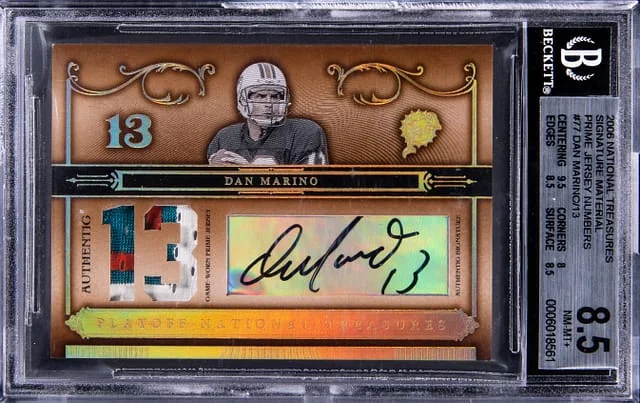 2005 Panini National Treasures Dan Marino Signature Material Prime Jersey Numbers #77 card image