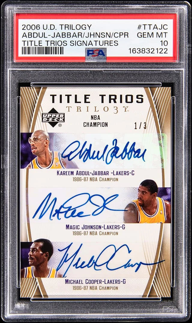 2006-07 Upper Deck Trilogy Kareem Abdul-Jabbar/Magic Johnson/Michael Cooper Multi-Signed Title Trios Signatures #TT-AJC card image