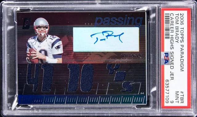 2006 Topps Tom Brady Paradigm Career Highs Signed Jersey #TBR card image
