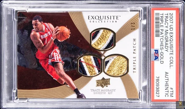 2007-08 Upper Deck Exquisite Collection Tracy McGrady Triple Patches Gold #TRIP-TM card image