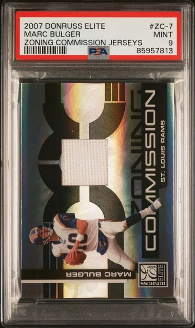 2007 Donruss Elite Marc Bulger Game-Used Zoning Commission Jerseys #ZC-7 card image