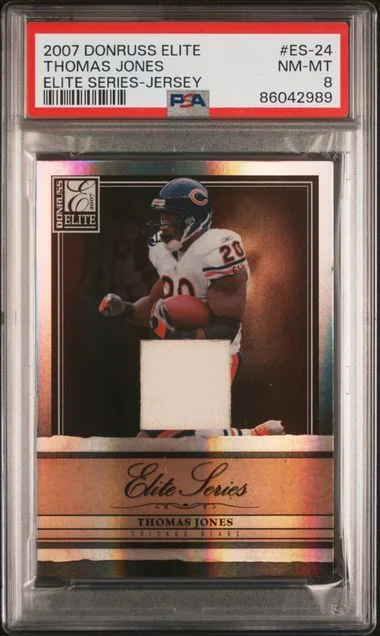 2007 Donruss Elite Thomas Jones Game-Worn Elite Series Jersey #ES-24 card image