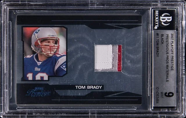 2007 Donruss Tom Brady Playoff Prestige Prestgious Pros Materials #PP-11 card image