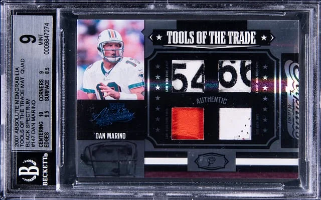 2007 Panini Absolute Dan Marino Memorabilia Tools of The Trade Materials Quad Black Spectrum #TOT-147 card image