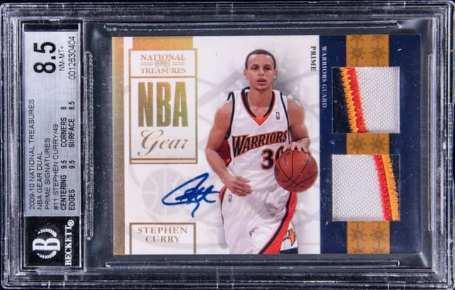 2009-10 Panini National Treasures Stephen Curry NBA Gear Trios #11 card image
