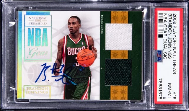 2009-10 Panini Playoff Brandon Jennings National Treasures NBA Gear Dual Signature #15 card image