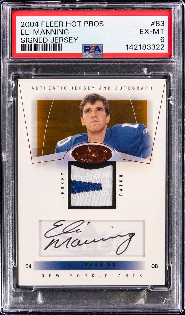 2009 Fleer Hot Prospects Eli Manning Signed Jersey #83 card image