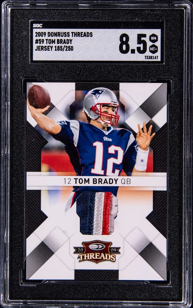 2009 Panini Donruss Tom Brady Threads Jersey #59 card image