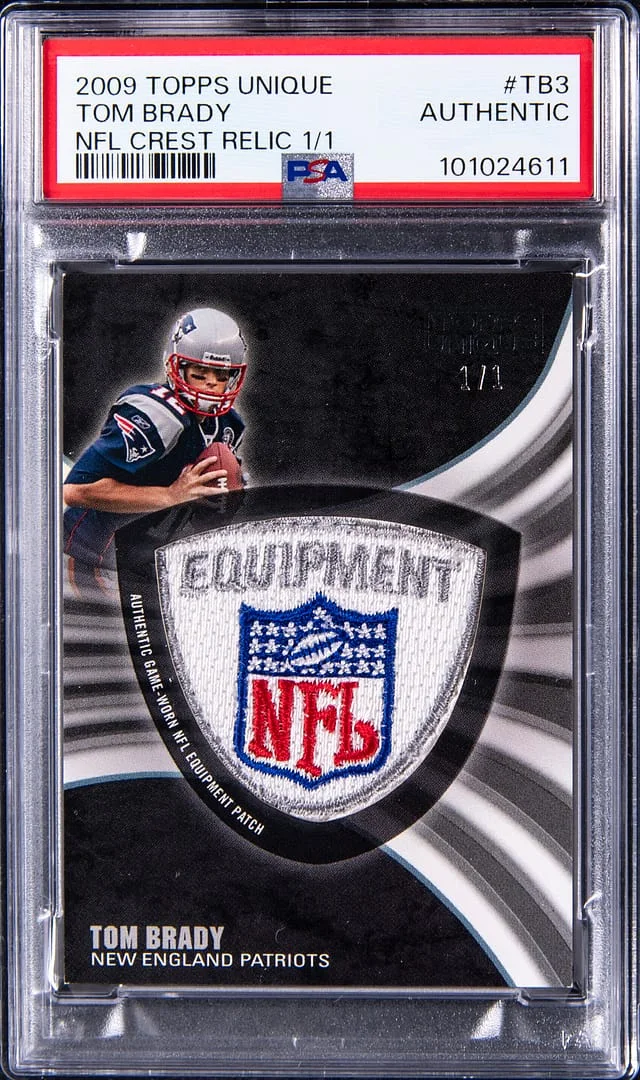 2009 Topps Tom Brady Unique NFL Crest Relic #NFLC-TB3 card image