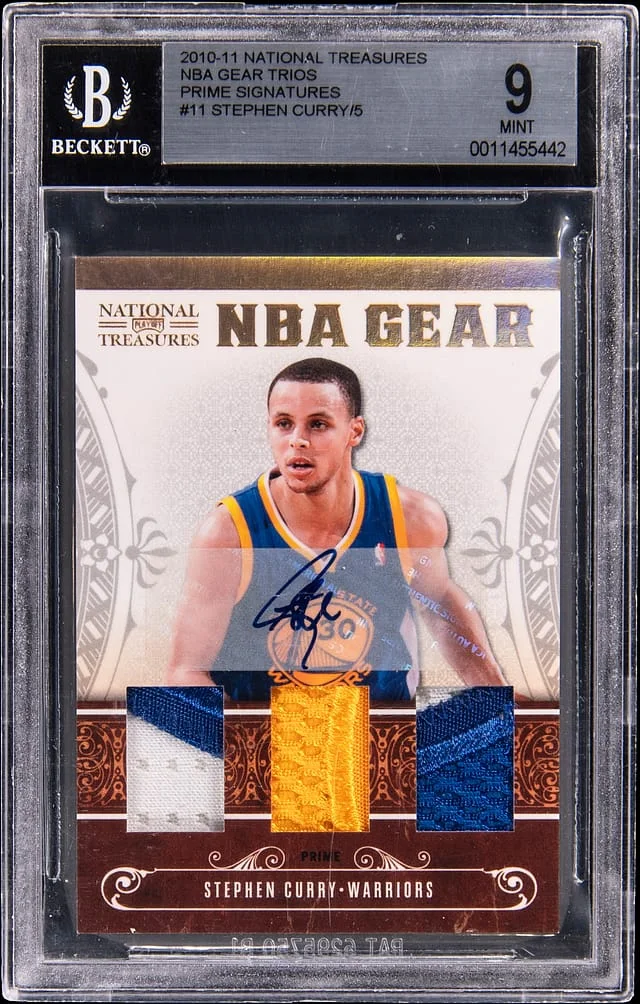 2010-11 Panini National Treasures Stephen Curry NBA Gear Trios Prime Signatures #11 card image