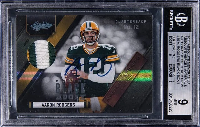2011 Panini Absolute Aaron Rodgers Memorabilia Absolute Heroes Materials Autographs Spectrum Prime Black Box #10 card image