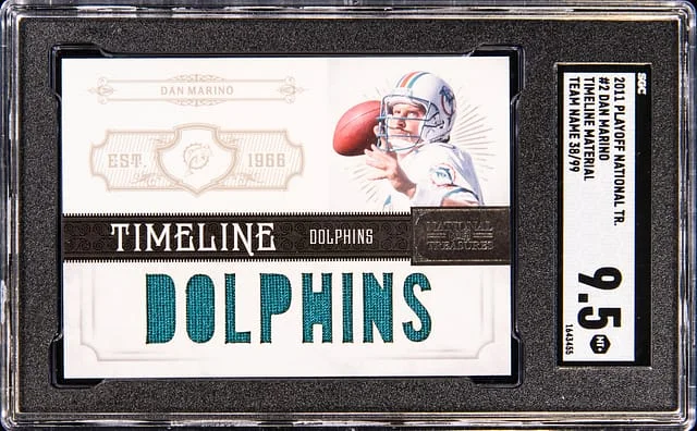 2011 Panini National Treasures Dan Marino Playoff Timeline Material Team Name #2 card image