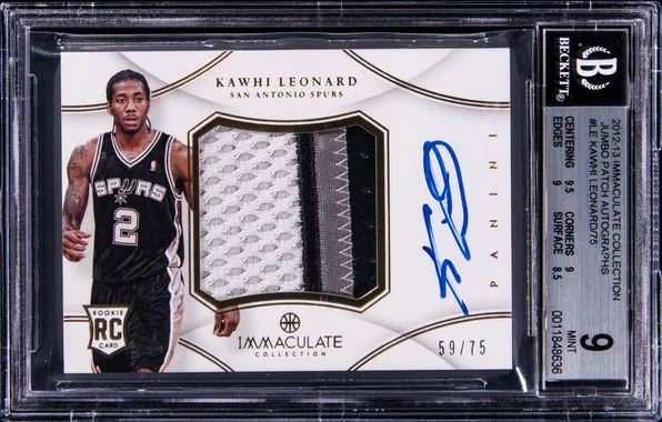 2012-13 Panini Immaculate Collection Jumbo Patch Autographs Le Kawhi Leonard /75 #no-number card image