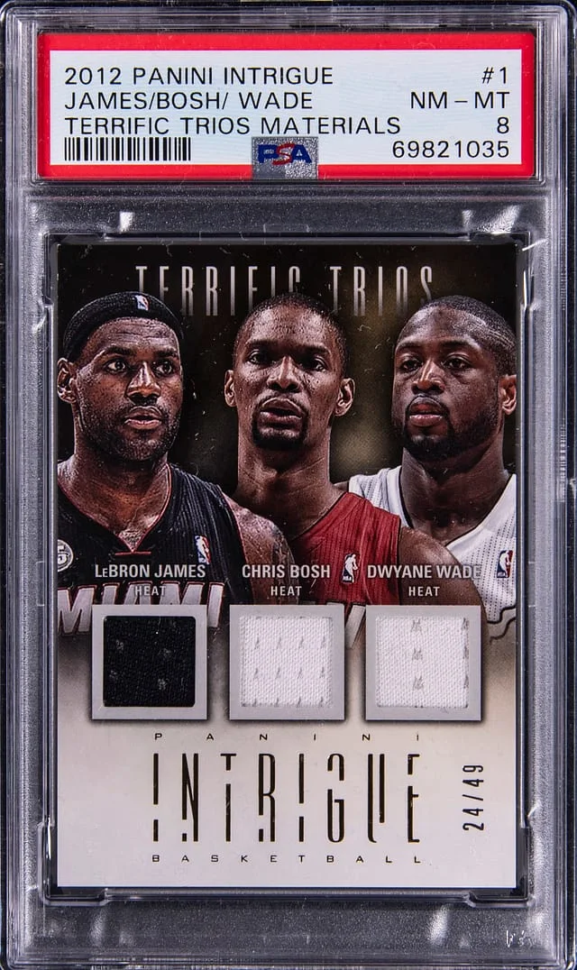 2012-13 Panini James/Bosh/Wade Intrigue Terrific Trios Materials #1 card image