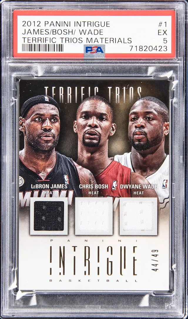 2012-13 Panini LeBron James/Chris Bosh/Dwyane Wade Intrigue Terrific Trios Materials #1 card image