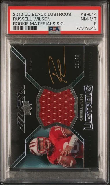 2012 UD Black Russell Wilson Lustrous Materials Signature #BRL14 card image